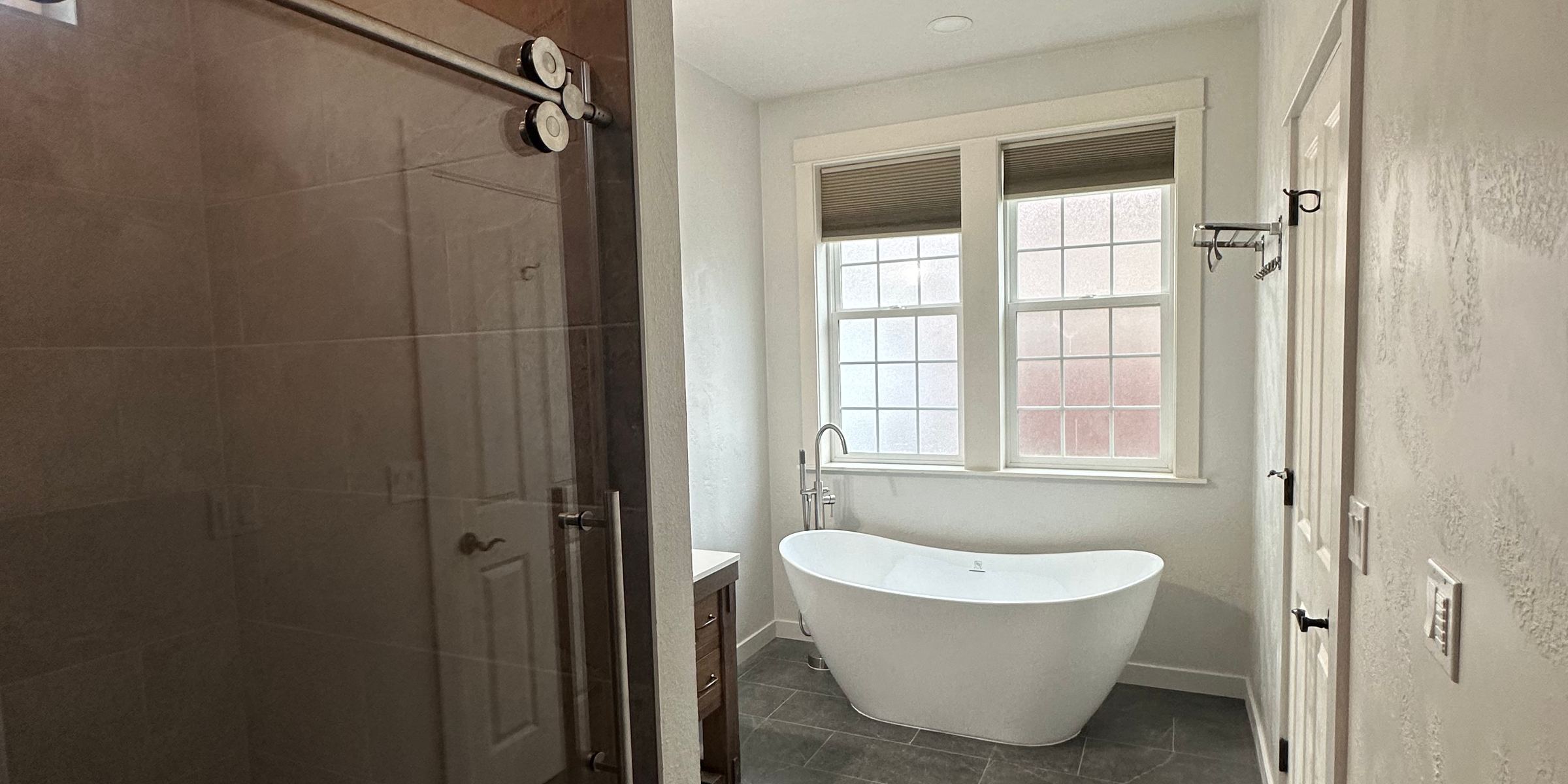 Finished tile walk-in shower and freestanding tub — Eagle Point bathroom remodel