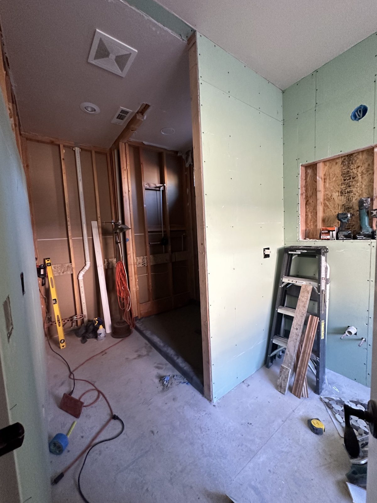 Bathroom demolition with framing exposed